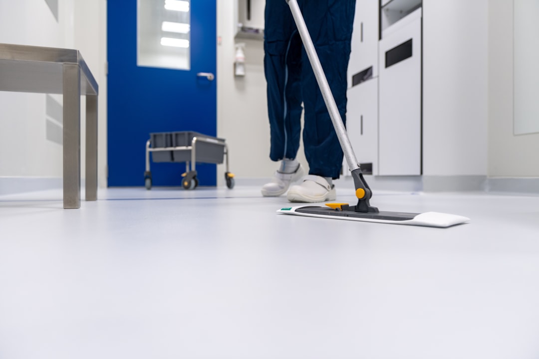 home-services-004 Cleaner cleaning the floor in a laboratory environment