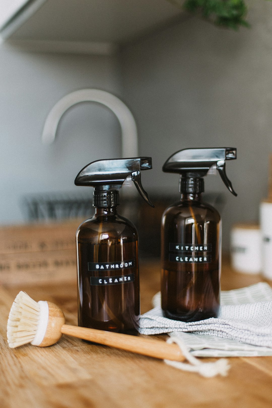 home-services-03 two-brown-spray-bottles-on-brown-table-uoomllxe6ge